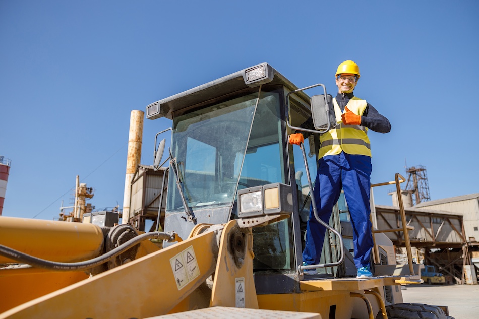 image of man cheerful from cost savings of gm machinery movers